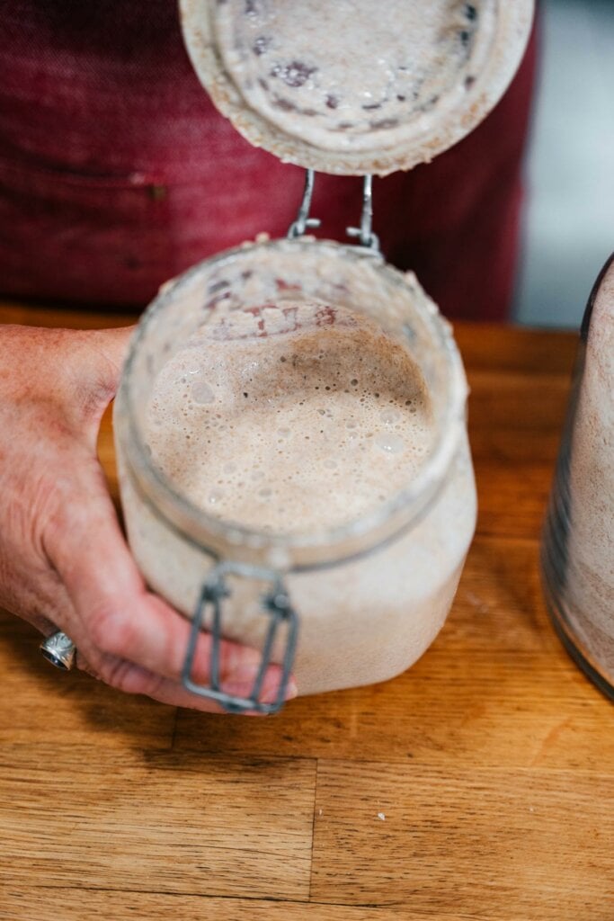 Sourdough starter in a glass jar.